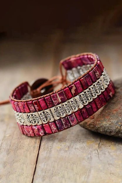 Handmade triple-layer natural stone bracelet by MANDOTOS with smooth beads and stylish design, perfect for casual or elegant wear.
