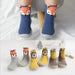 Mandotos Happy Feet toddler shoes in soft fabric with sturdy soles, designed for comfortable early walking for young children.