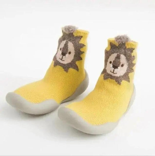 Mandotos Happy Feet toddler shoes in soft fabric with Velcro straps, designed for comfort and easy wear for young children.
