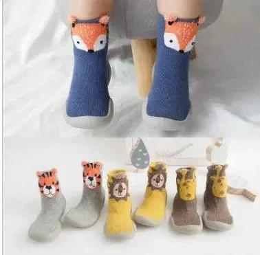 Mandotos Happy Feet toddler shoes in colorful design, featuring soft soles and adjustable straps for young children's comfort.