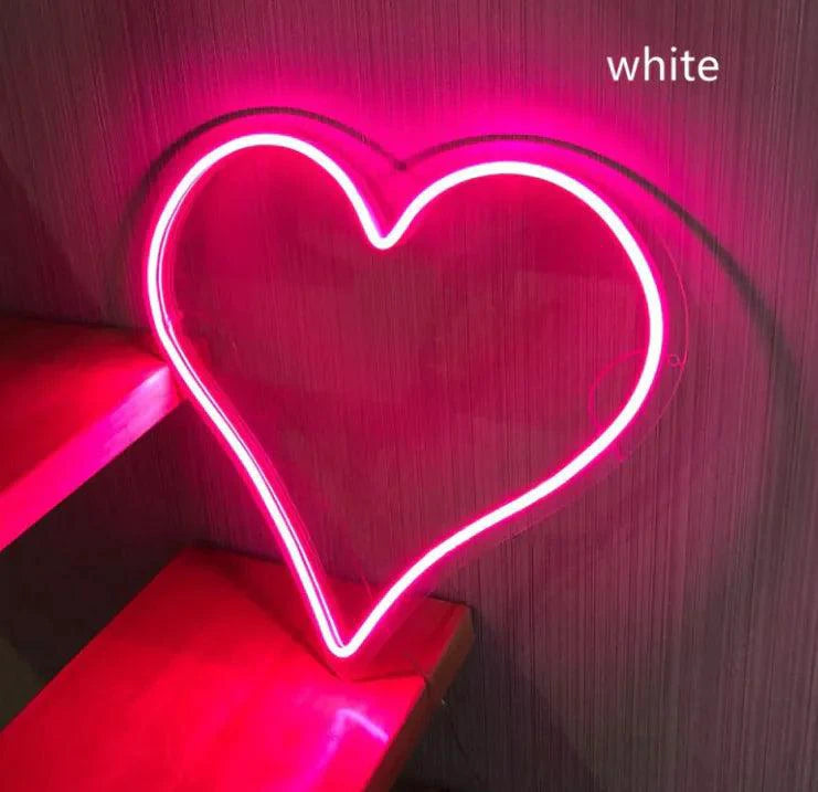Mandotos Heart Glow LED neon light illuminating in pink, perfect for decorative wall or room lighting.