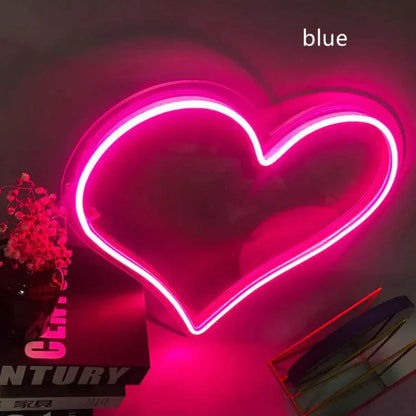 Mandotos Heart Glow LED Neon Light illuminating a soft pink glow, perfect for room decor and ambient lighting.