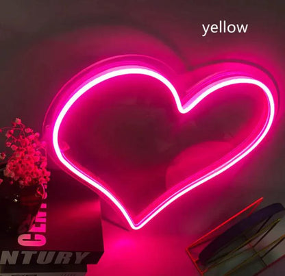 Mandotos Heart Glow LED Neon Light featuring a bright pink heart shape for decorative and ambient lighting.