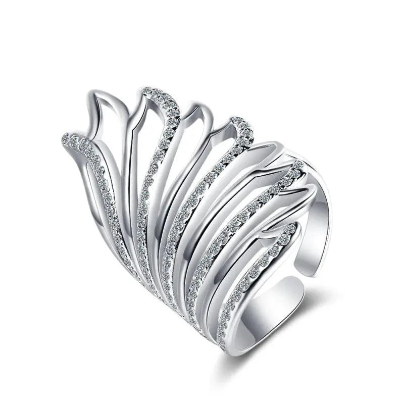 Mandotos Heavenly Diamond Wing Ring featuring a delicate wing design with sparkling diamonds on a silver band.
