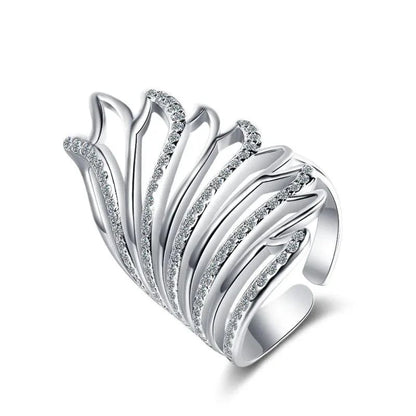 Mandotos Heavenly Diamond Wing Ring featuring sparkling diamonds and a delicate feather design in sterling silver.