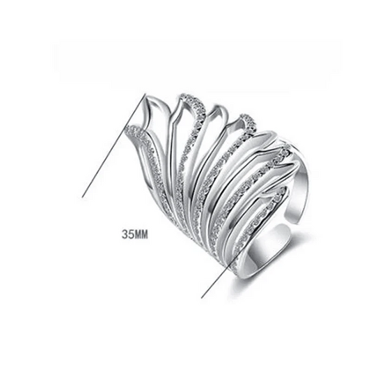 Mandotos Heavenly Diamond Wing Ring featuring sparkling diamond accents and intricate wing design on silver band.