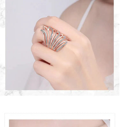 Mandotos Heavenly Diamond Wing Ring featuring sparkling diamonds and intricate wing design on sterling silver band