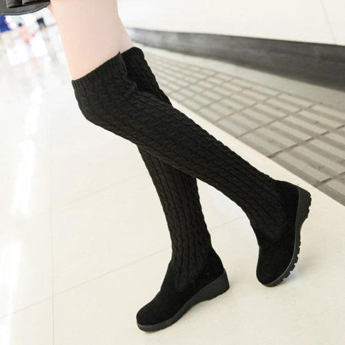 Mandotos high flat over-the-knee stretch Martin boots in black leather, stylish and fitted for a sleek look