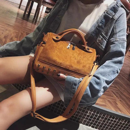 High-quality casual female shoulder tote bag by MANDOTOS with soft fabric and spacious design for everyday use.