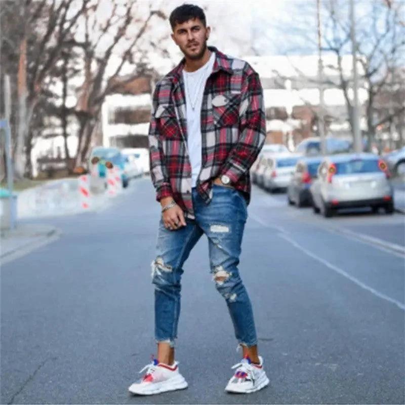 Mandotos men's jeans with stylish holes, classic blue denim, and modern distressed design for casual wear.