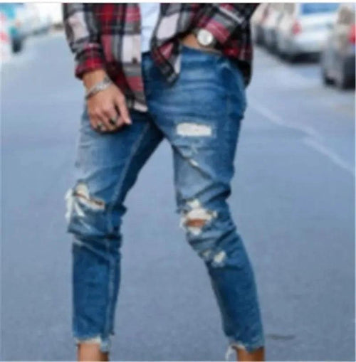 Mandotos men's jeans with stylish holes, featuring a classic denim design and modern distressed details.