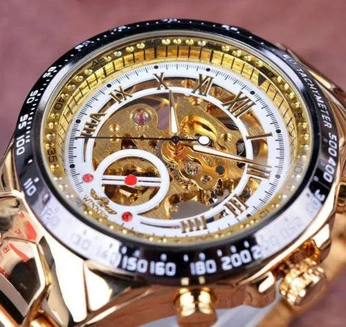 Mandotos hollow automatic mechanical watch with visible movement, sleek design, and stainless steel case.