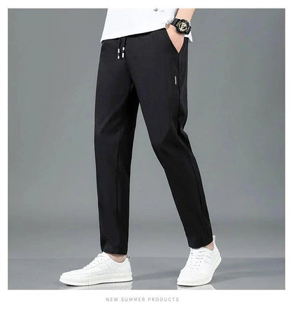 Mandotos Ice Silk men's summer casual pants in black and gray, featuring a straight-leg, elastic waistband, breathable and lightweight fabric.