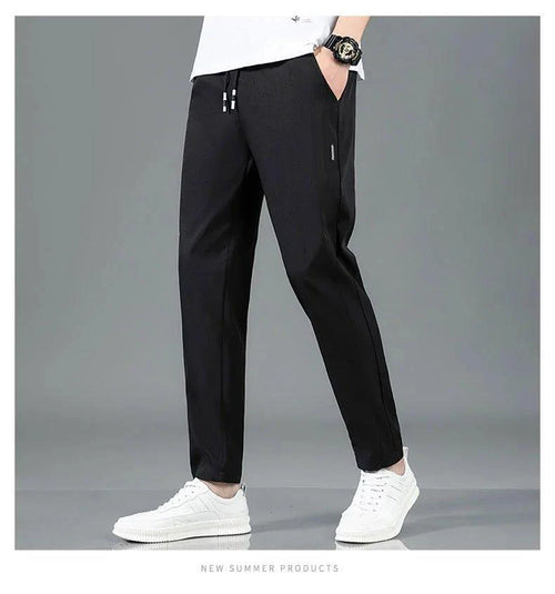 Mandotos Ice Silk men's summer casual pants in black and gray, featuring a straight-leg, elastic waistband, breathable and lightweight fabric.