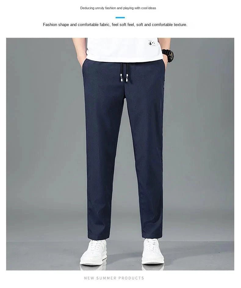 Mandotos Ice Silk men's summer casual pants in black and gray with elastic waistband, breathable straight-leg design, outdoor style.