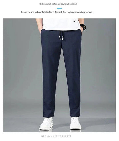 Mandotos Ice Silk men's summer casual pants in black and gray with elastic waistband, breathable straight-leg design, outdoor style.