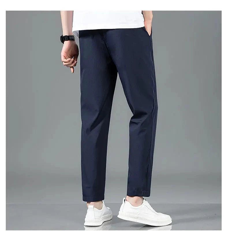 Mandotos Ice Silk men's summer casual pants in black and gray, breathable, elastic, straight-leg design, suitable for outdoor and business wear.