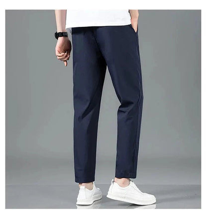 Mandotos Ice Silk men's summer casual pants in black and gray, breathable, elastic, straight-leg design, suitable for outdoor and business wear.