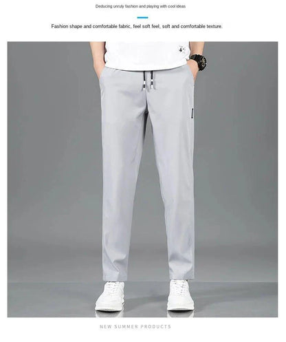 Mandotos Ice Silk men's summer black and gray casual pants with elastic waistband, breathable straight-leg design, suitable for outdoor wear.