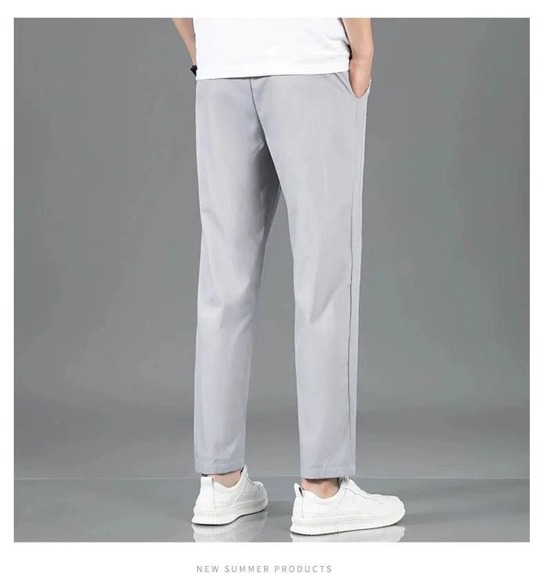Mandotos Ice Silk men's summer pants in black and gray, breathable, elastic, straight-leg casual and outdoor sweatpants.