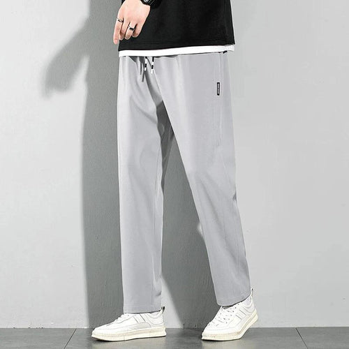Mandotos Ice Silk men's summer casual pants in black and gray, featuring a straight leg, elastic waistband, breathable fabric.