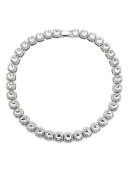 Mandotos Illumina tennis chain with clustered stones and radiant embellishments, showcasing elegant jewelry design and sparkling details.