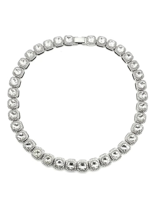Mandotos Illumina tennis chain with clustered stones and radiant embellishments, showcasing elegant jewelry design and sparkling details.