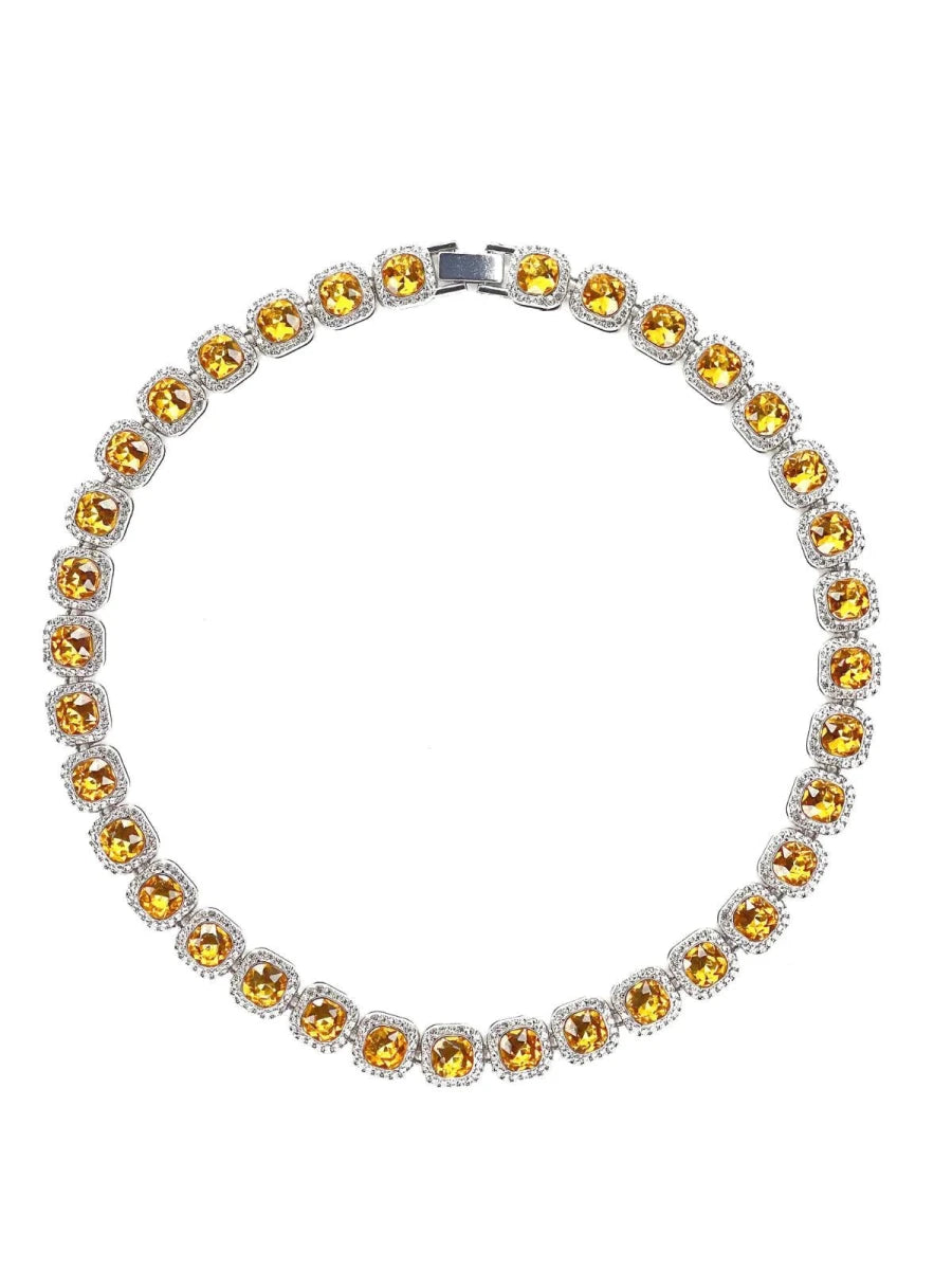 Mandotos Illumina tennis chain with clustered stones and radiant embellishments, showcasing elegant jewelry design.