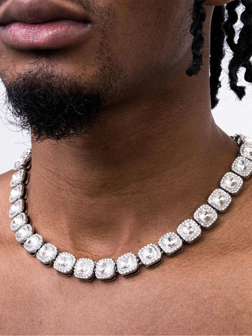 Mandotos Illumina tennis chain with clustered stones and radiant embellishments, showcasing elegant, sparkling jewelry design.