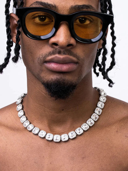 Mandotos Illumina Tennis Chain featuring clustered stones and radiant embellishments showcasing elegant jewelry design.