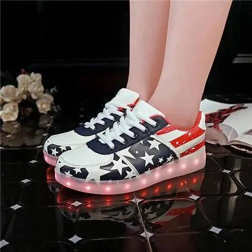 Mandotos LED light-up sneakers with sparkling soles, showcasing the illuminated design and vibrant style for active wear.