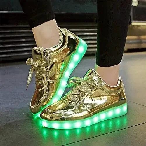 Mandotos LED light-up sneakers with illuminated soles, showcasing a sparkling, vibrant design for stylish nighttime wear.