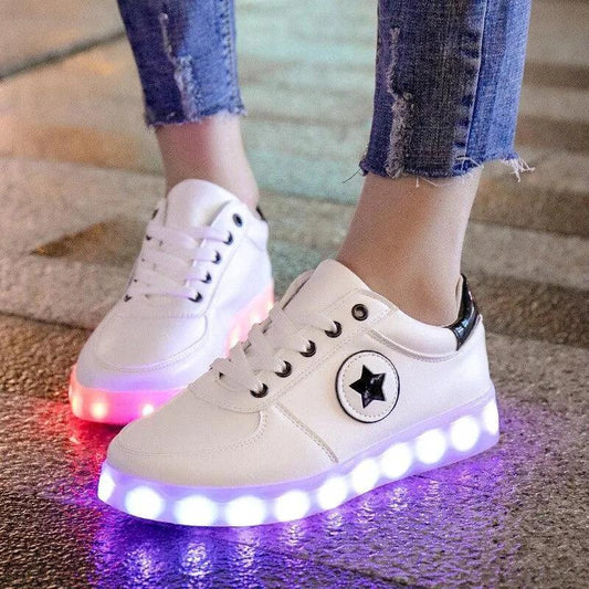 Mandotos LED light-up sneakers with sparkling soles, designed for vibrant, illuminated steps and trendy style.