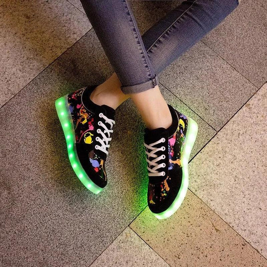 Mandotos LED light-up sneakers with glowing soles, featuring a stylish design for sparkling, illuminated steps.