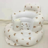 Inflatable baby chair by MANDOTOS designed for dining and bath, with soft, durable material and secure seating for infants.