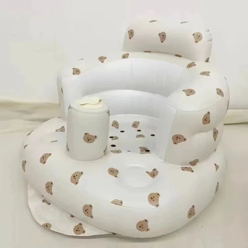 Inflatable baby chair by MANDOTOS designed for dining and bath, with soft, durable material and secure seating for infants.