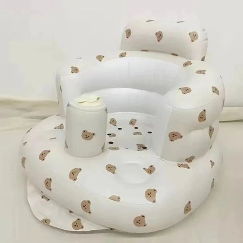 Inflatable baby chair by MANDOTOS designed for dining and bath, with soft, durable material and secure seating for infants.