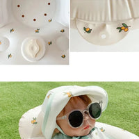 Inflatable baby chair by MANDOTOS designed for dining and bath, with soft, colorful, and supportive seating for infants.
