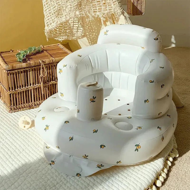 Inflatable baby chair for dining and bath by MANDOTOS, showing the soft, colorful seat with safety features and support for infants.