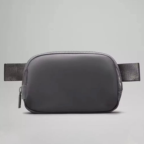 Mandotos International 1L breathable women's fanny pack for travel and outdoor use, featuring adjustable strap and secure zipper.