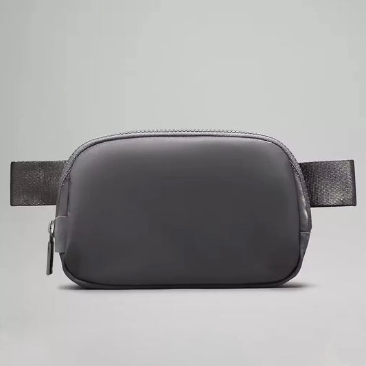 Mandotos International 1L breathable women's fanny pack for travel and outdoor use, featuring adjustable strap and secure zipper.