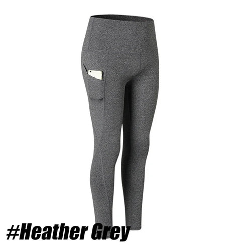 Plus size Mandotos International women's yoga pants with pockets, high waist, elastic fit, solid color, ideal for fitness and running.