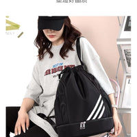 Mandotos International 2024 drawstring backpack with front pocket, large capacity for outdoor, travel, gym, and basketball use.