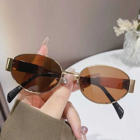 Mandotos International 2024 women's geometric PC sunglasses with elliptical metal frame, large and stylish for a modern look.