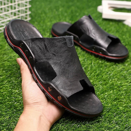 Retro leather men's summer beach slippers by MANDOTOS INTERNATIONAL, flat slip-on sandals perfect for casual summer wear.