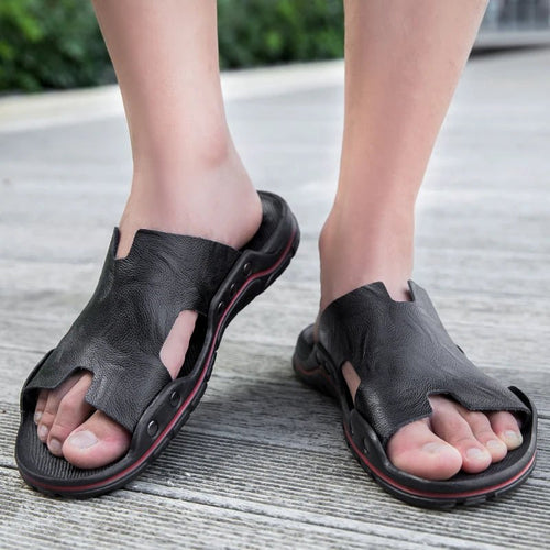 Mandotos International 2026 retro leather men's summer beach slippers with flat sole and casual slip-on design.