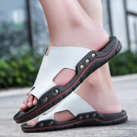 Retro leather men's summer beach slippers by MANDOTOS INTERNATIONAL, flat sandals with open-toe design for casual wear.