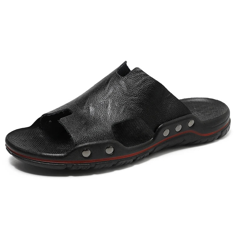 Retro leather men's summer beach slippers by MANDOTOS INTERNATIONAL featuring flat sandal design and casual open-toe style.