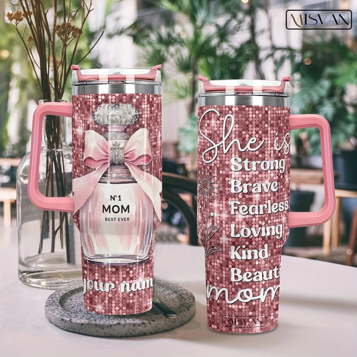 40 oz stainless steel vacuum travel mug with handle by MANDOTOS INTERNATIONAL, showing the sleek, insulated design and sturdy handle.
