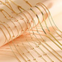 Eight-piece gold-plated waist chain set featuring beaded, sequin, CZ coin designs, adjustable body jewelry from MANDOTOS INTERNATIONAL.